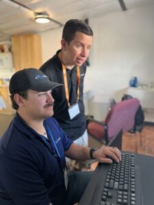 IT Support Paul and Tyson helping a client