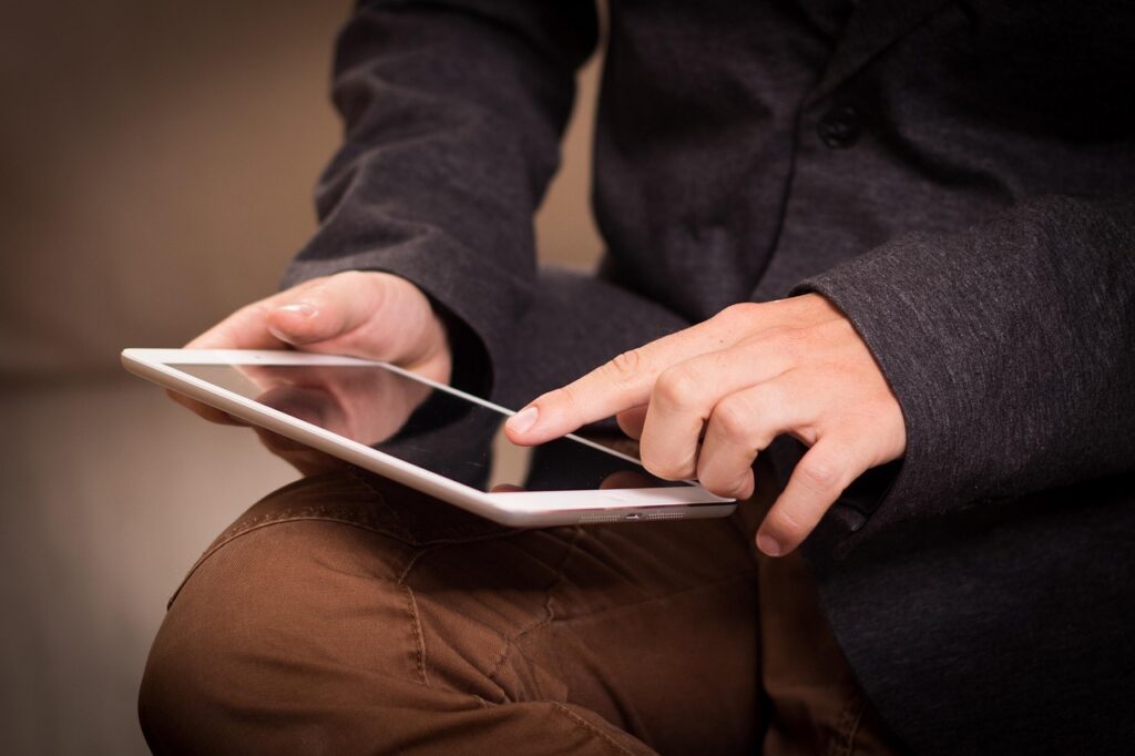 man using tablet