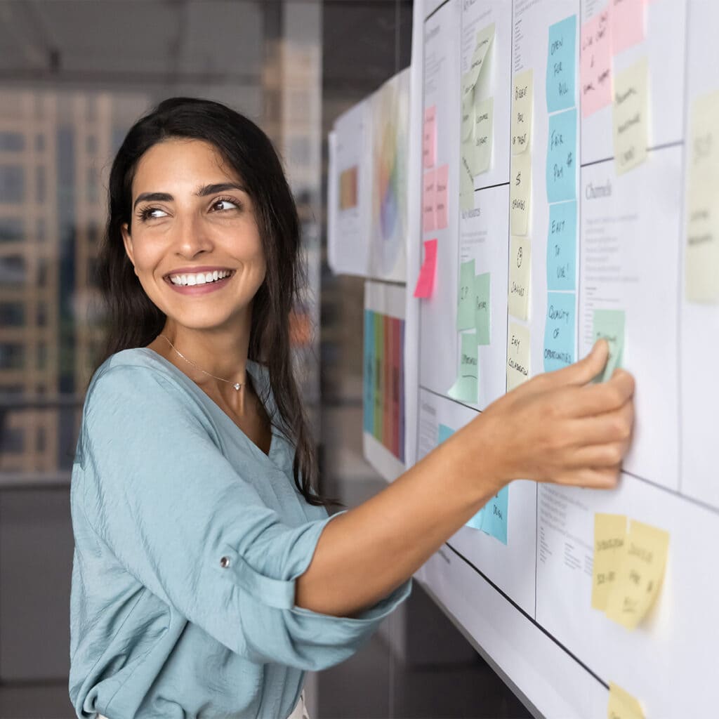 office manager coordinating with staff on a project