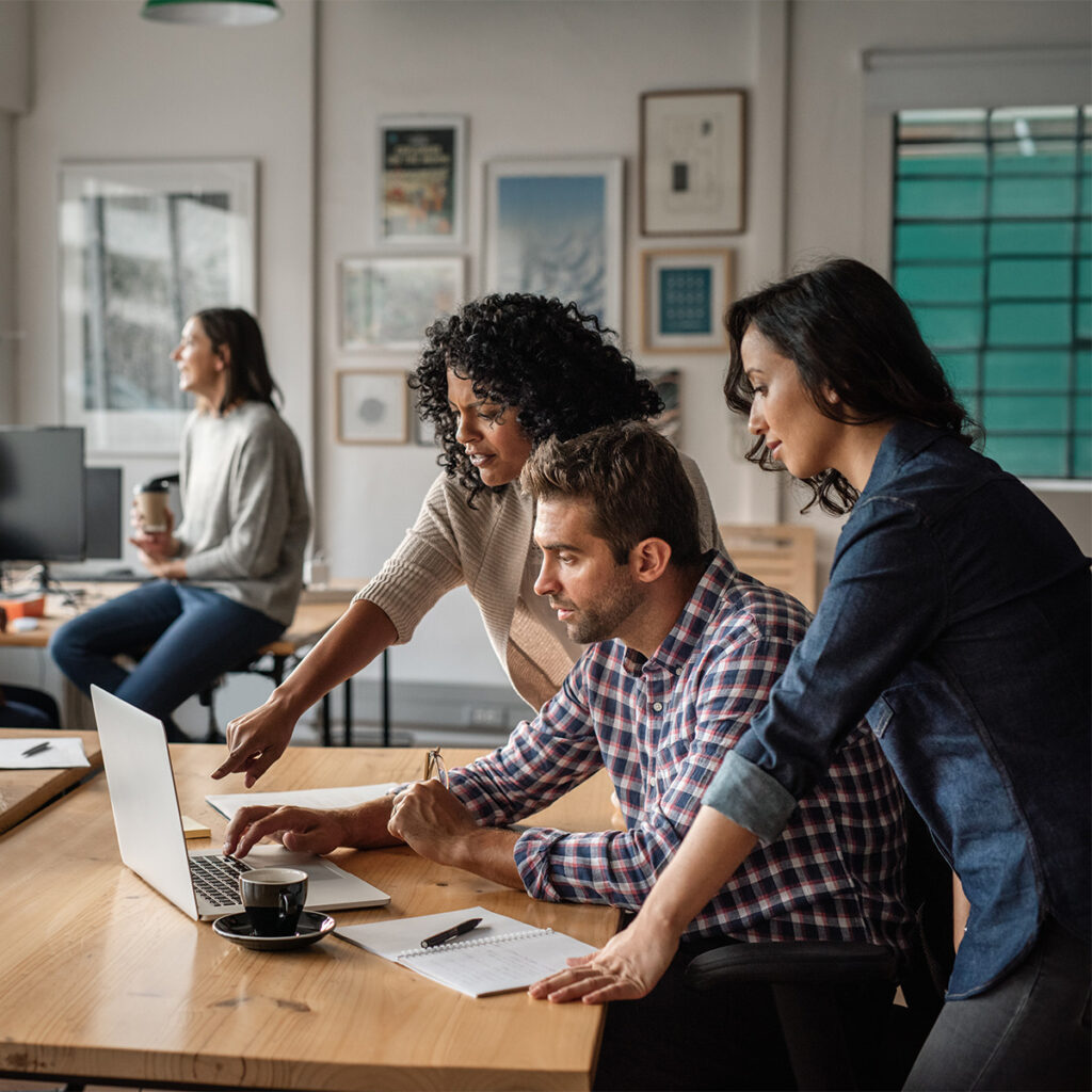 small business employees working on a computer