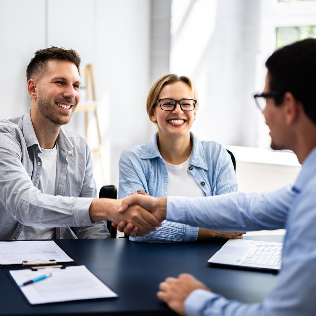 people striking a deal for cyber security insurance