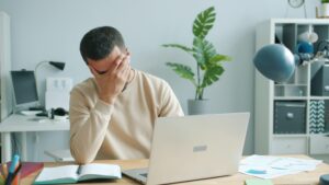 Man frustrated over a computer issue