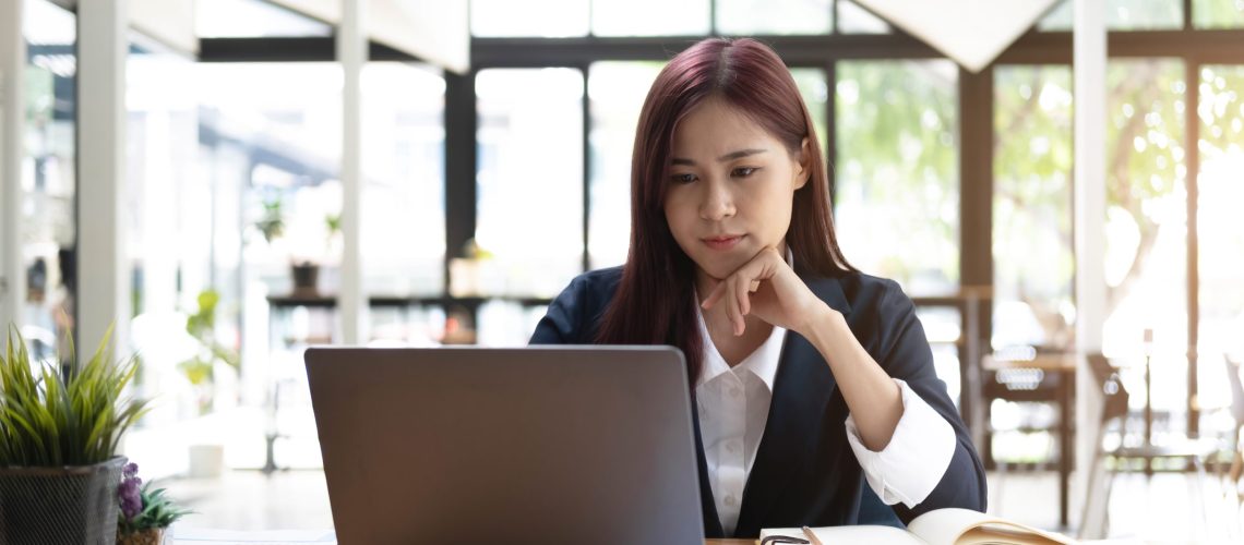 asian woman working laptop business woman busy wo 2022 10 03 22 30 44 utc scaled