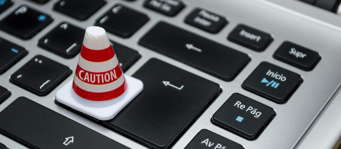 White caution cone on keyboard